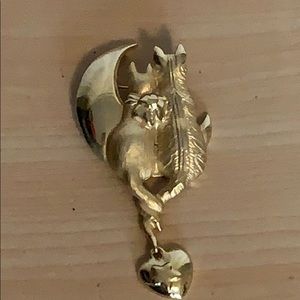 Half moon and cat gold colored brooch